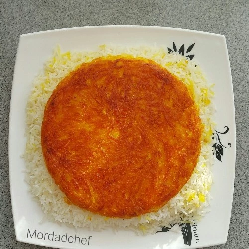 عکس ته دیگ سیب زمینی رنده شده