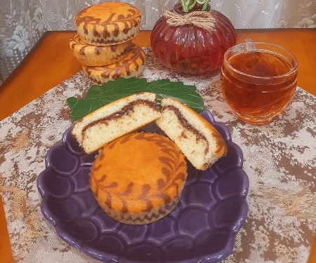 کاپ کیک با مغزی نارگیل و گردو